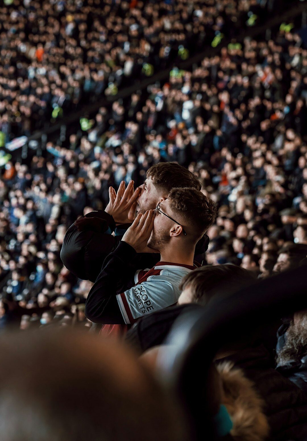 people in crowd looking worried